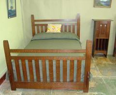 Shown with mattress and bed cover in room setting.
